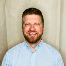 [Photo of Seth Riley]