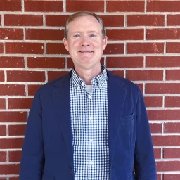 [Photo of Chris Carter]