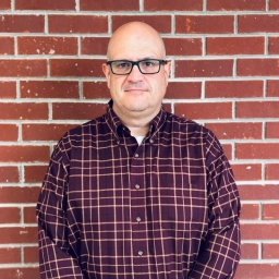 [Photo of Mark Carnathan]