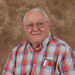 [Photo of Tom Davis]