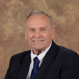 [Photo of Bruce Michaelson]