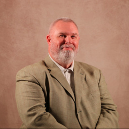 [Photo of Joe Burns]